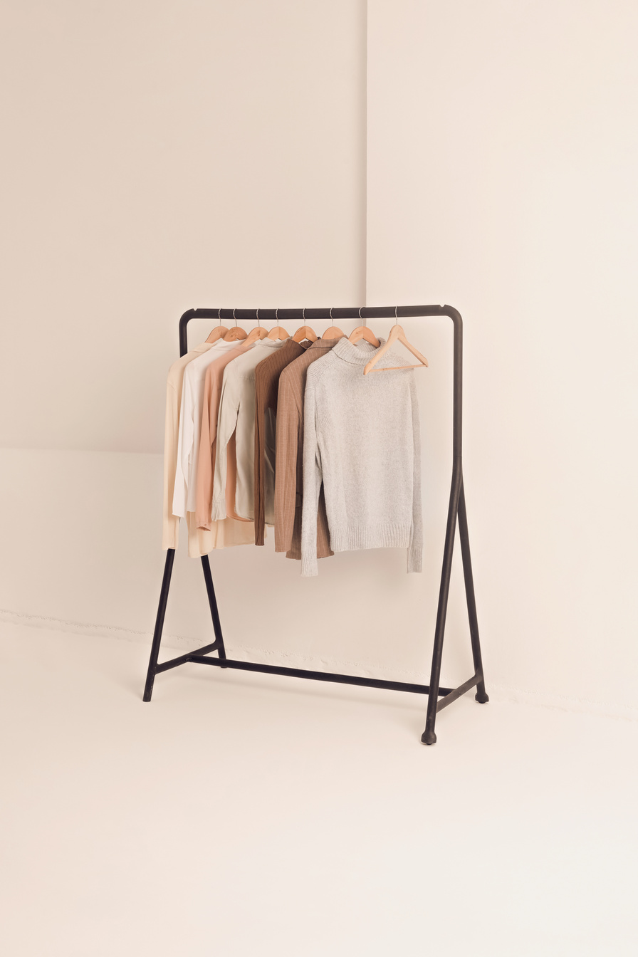 Clothes Hanging in Clothes Rack